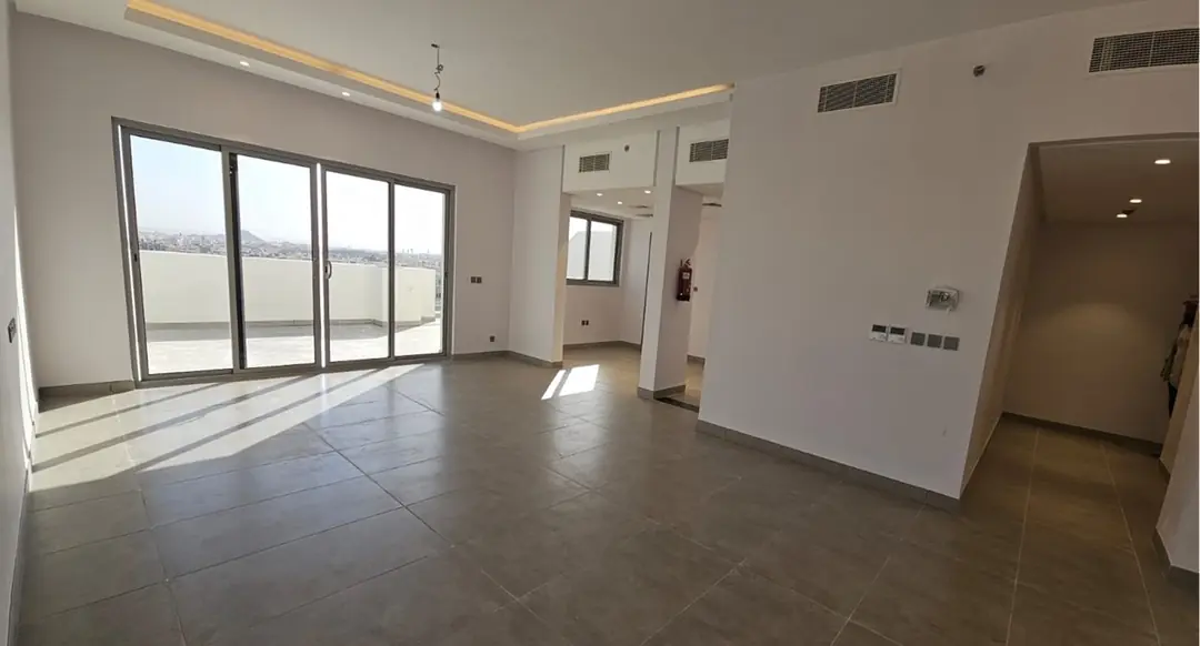 128-129 interior - living and terrace